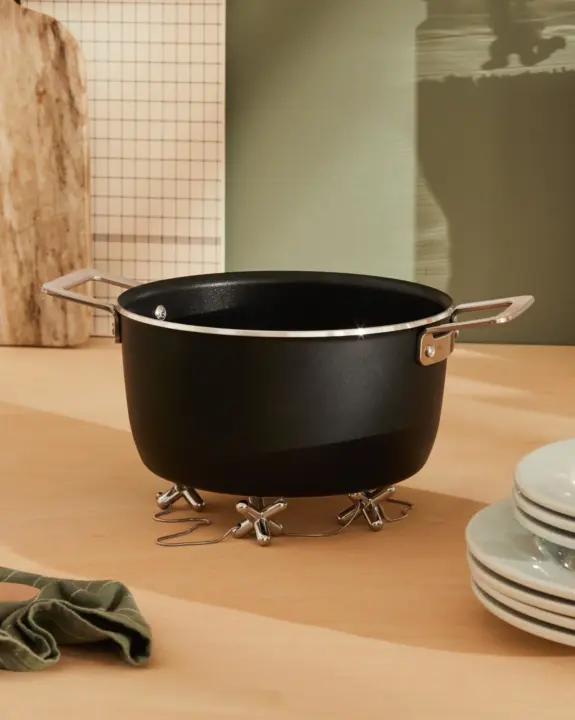 Dessous-de-plat modulable Tripod en acier – Alessi